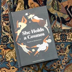 She Holds a Cosmos Poems on Motherhood